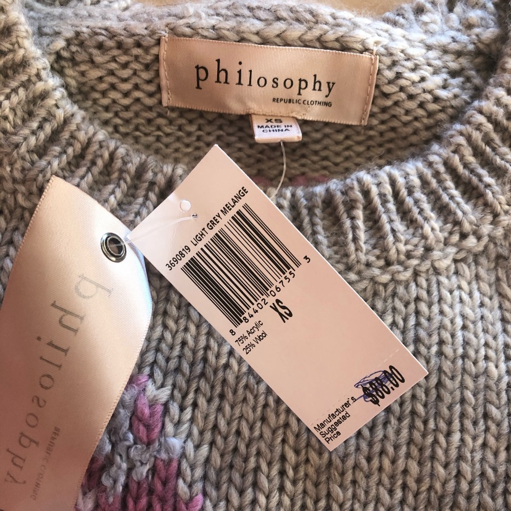 Super cute high-end looking XS sweater.